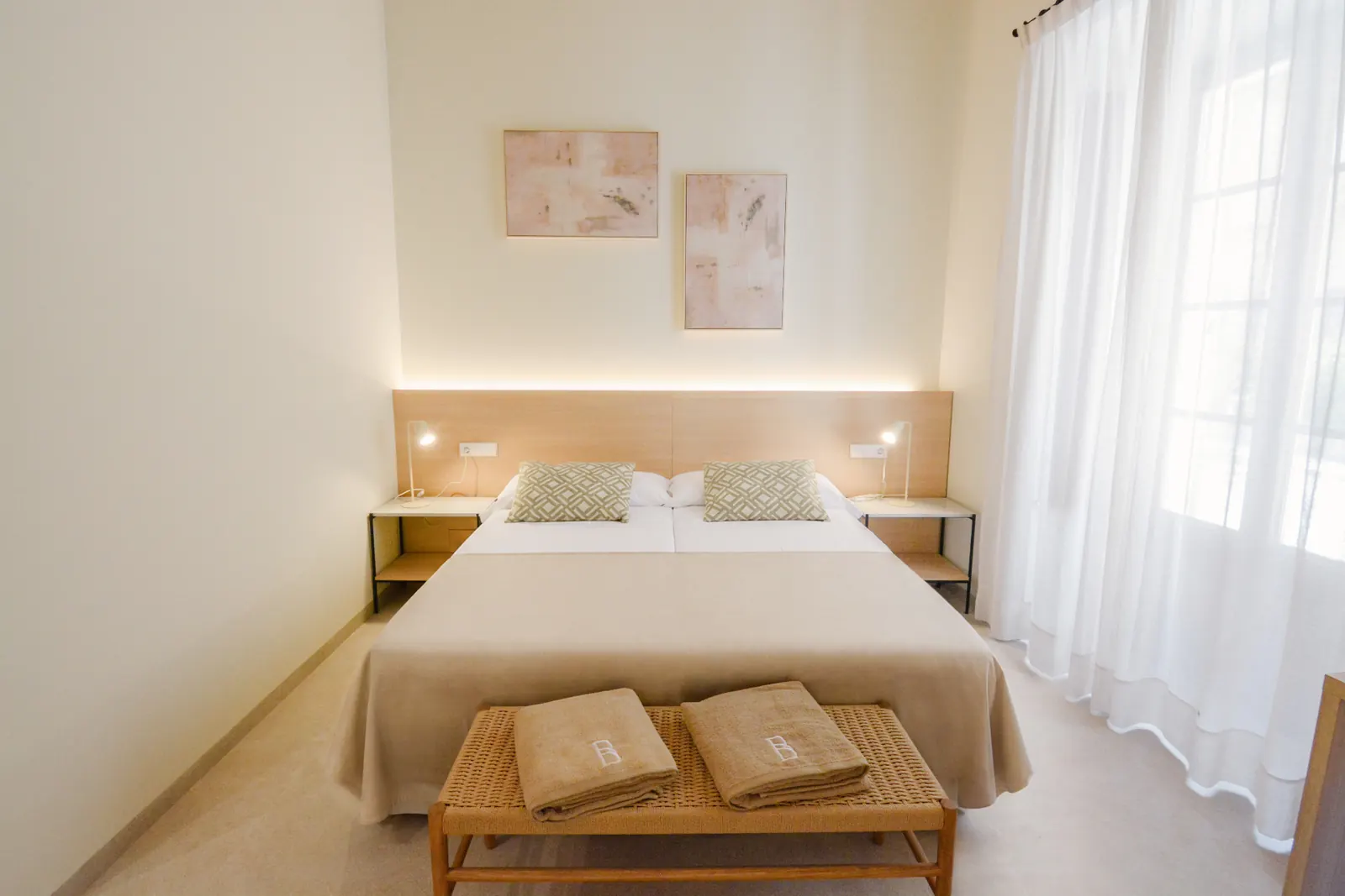Double Room bed view with natural light