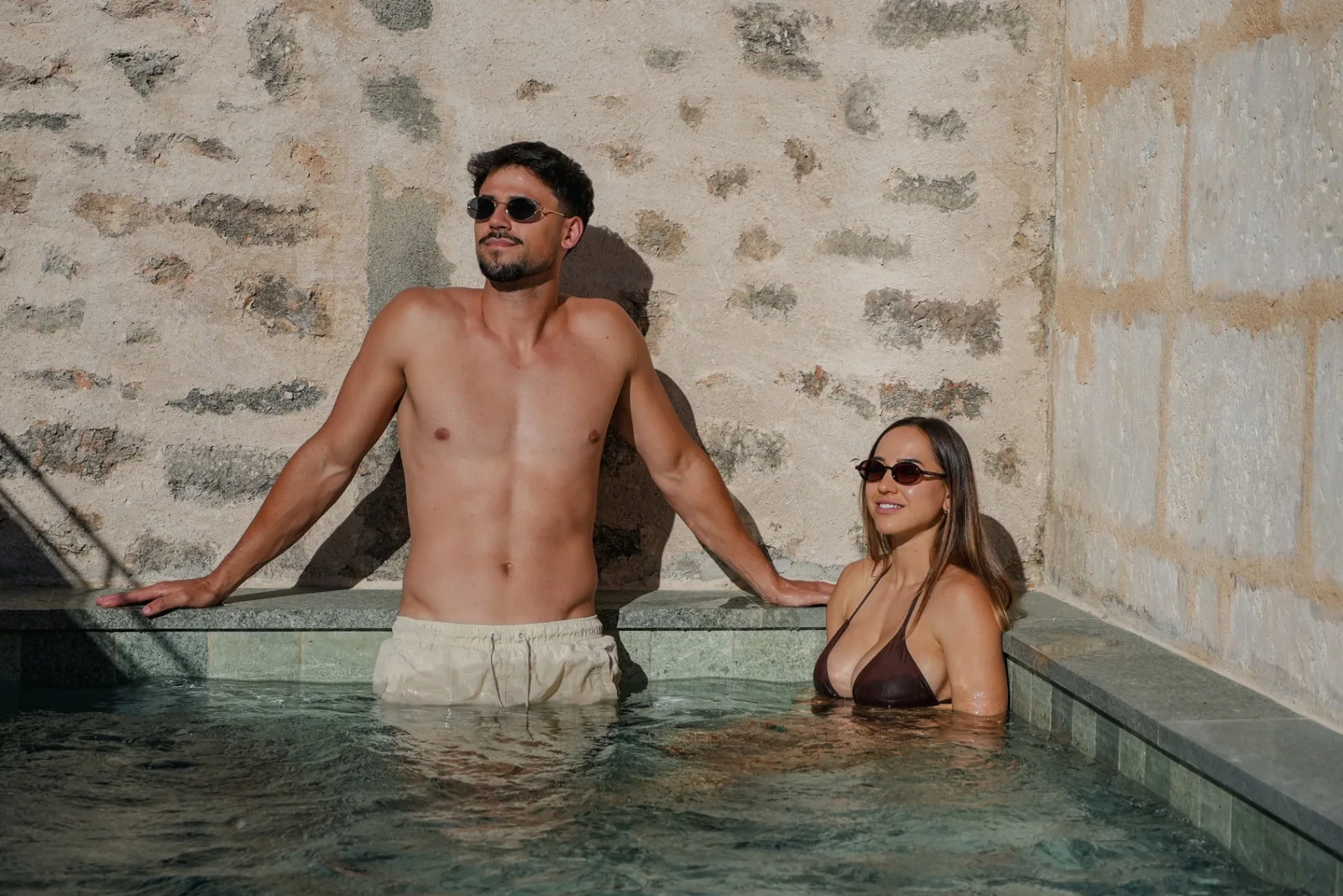 Guests enjoying the pool at BYTRA Boutique Hotel